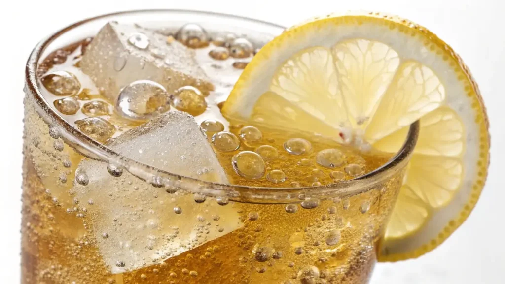 probiotic ginger bug soda served with lemon and ice